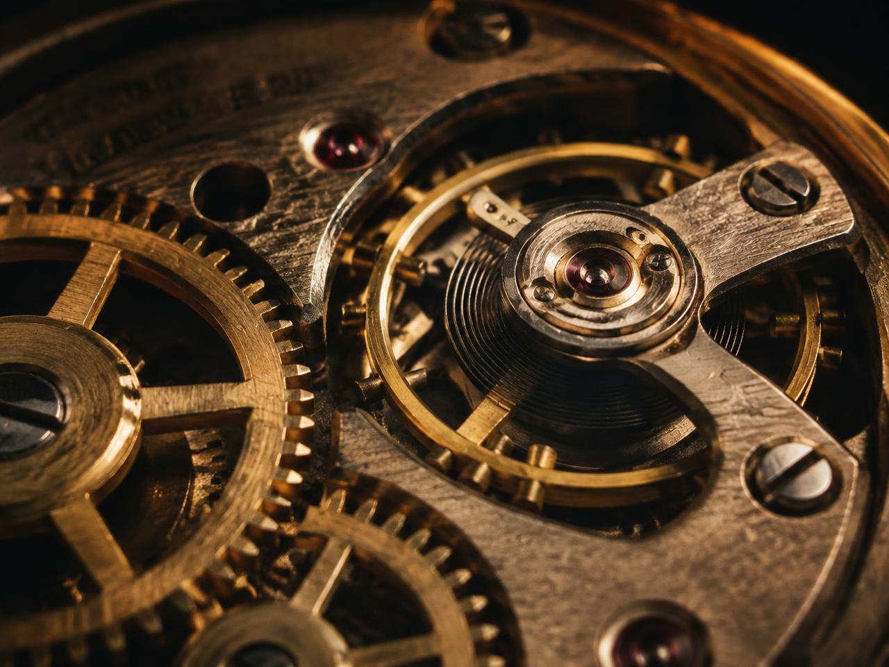 Macro study of a mechanical watch movement — balance wheel and gears