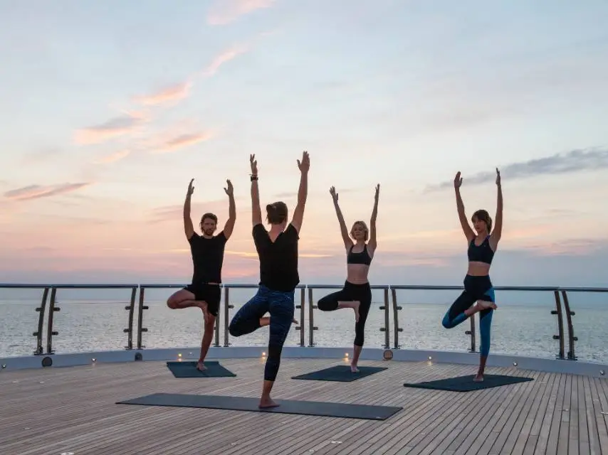 Sunrise yoga at sea wellness